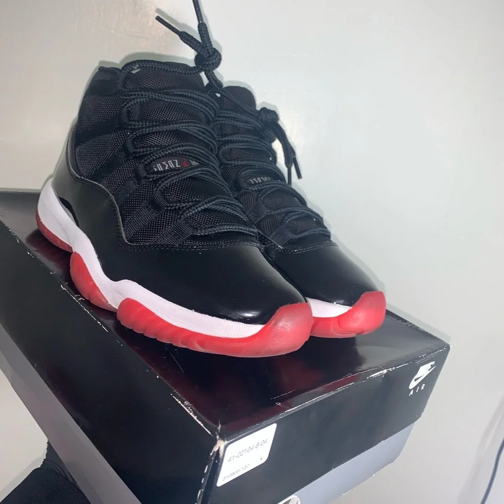 Jordan Men's Black and Red Retro 11 Sneakers